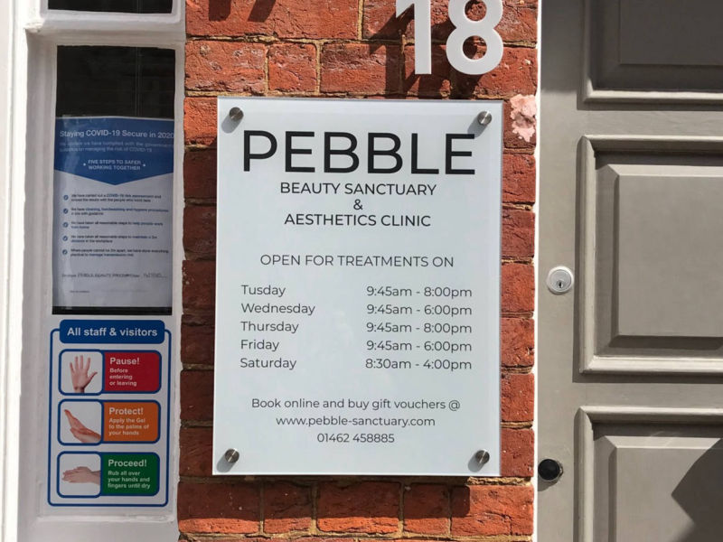 hair dresser opening times sign 