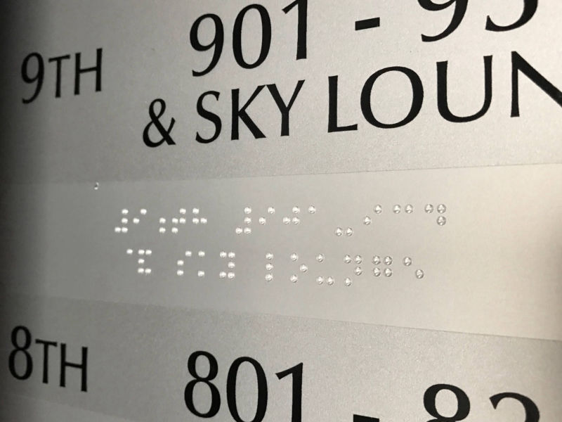 laser braile signage