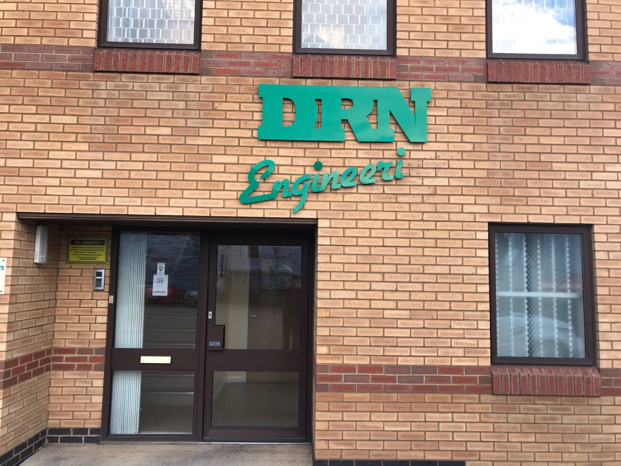 acrylic unit exterior signage 